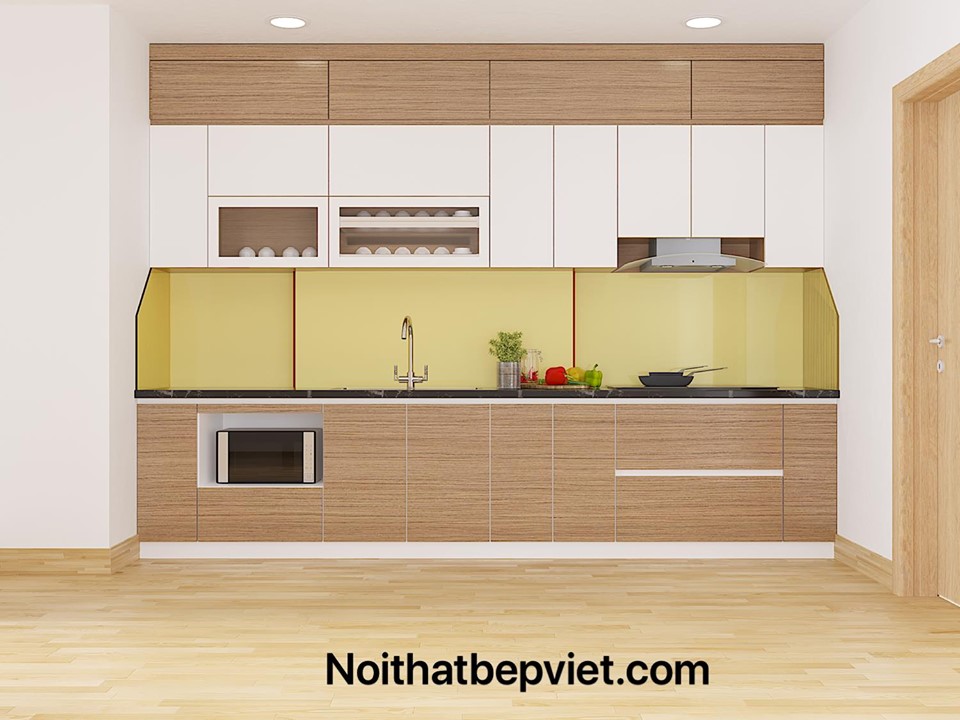 Tủ bếp gỗ công nghiệp MDF phủ melamin mang đến sự đa dạng về kiểu dáng và màu sắc để bạn lựa chọn phù hợp với phong cách thiết kế của ngôi nhà. Hình ảnh này sẽ cho thấy sự tiện nghi và hài hòa trong không gian tủ bếp này.